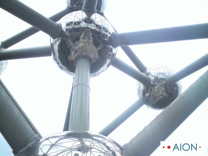 Close-up geometric view of the interconnected steel nodes of the Atomium in Brussels, symbolising complex European regulatory frameworks and legal localization