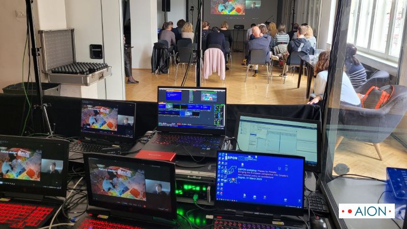 Technical desk with computers and mixette with conference hall